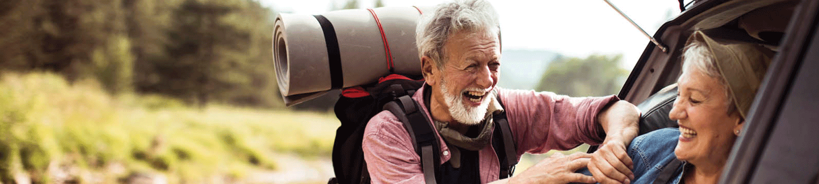 elderly couple hiking